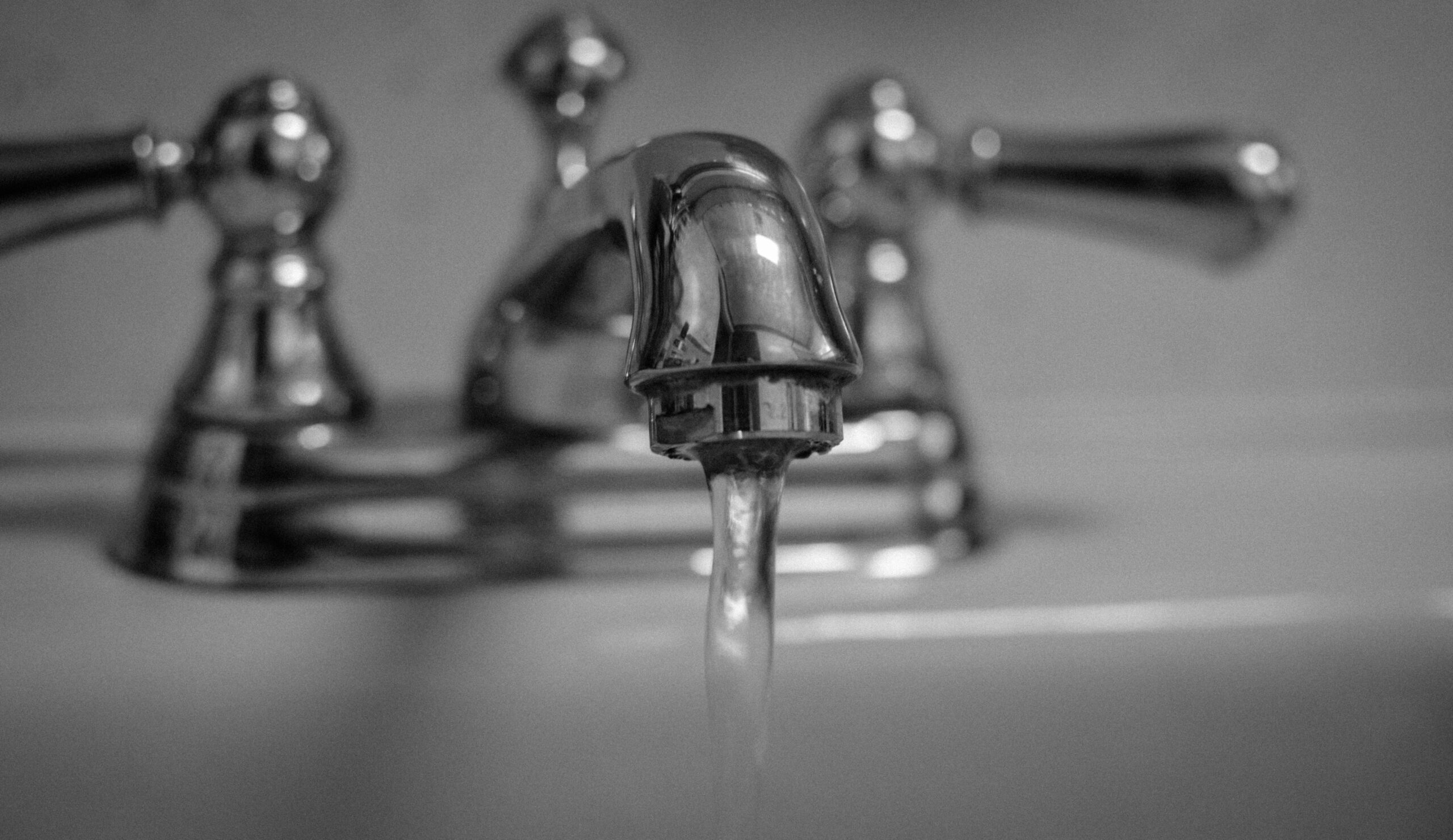 Running water from a faucet