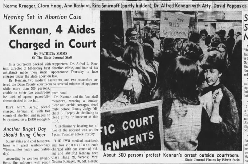 Annie Laurie Gaylor, then 15, is seen in the background of a 1971 protest photo, holding a sign that reads